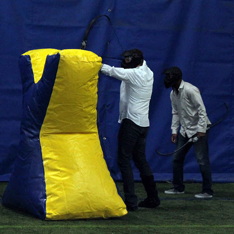 people playing archery tag