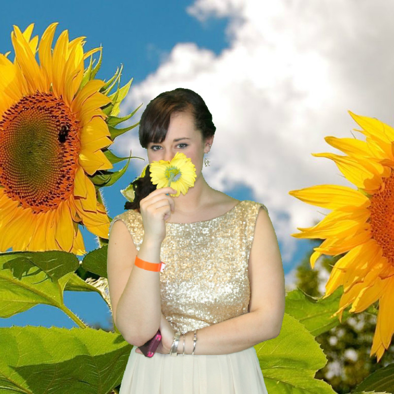 woman posing with a sunflower