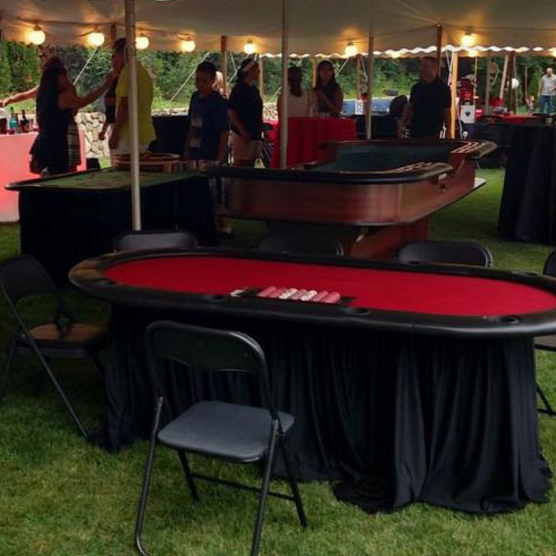 casino tables setup in an outdoor tent