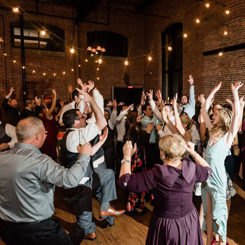 people dancing at a wedding reception