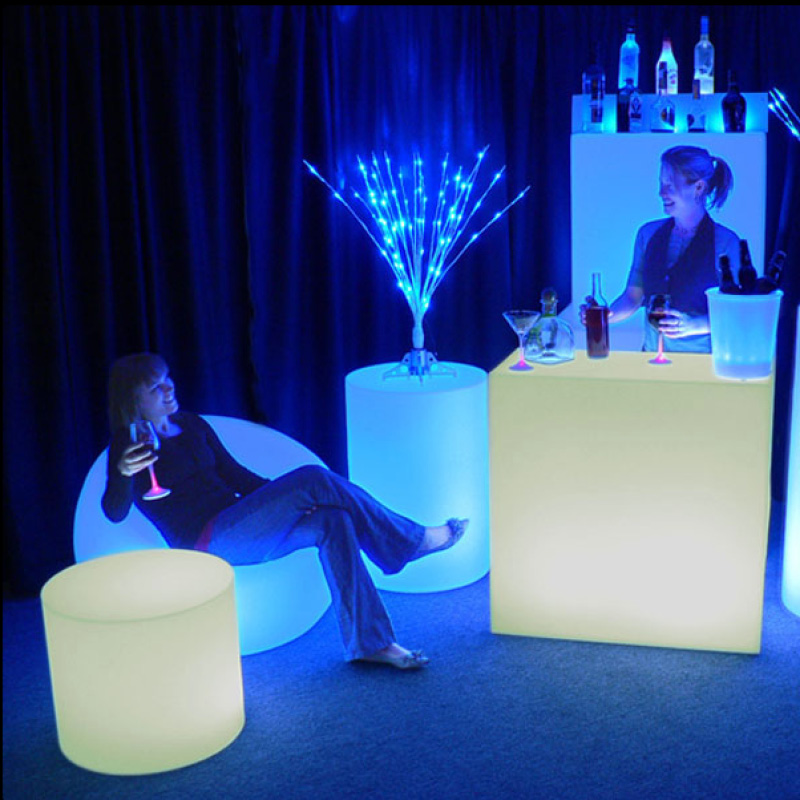 people sitting on illuminated furniture