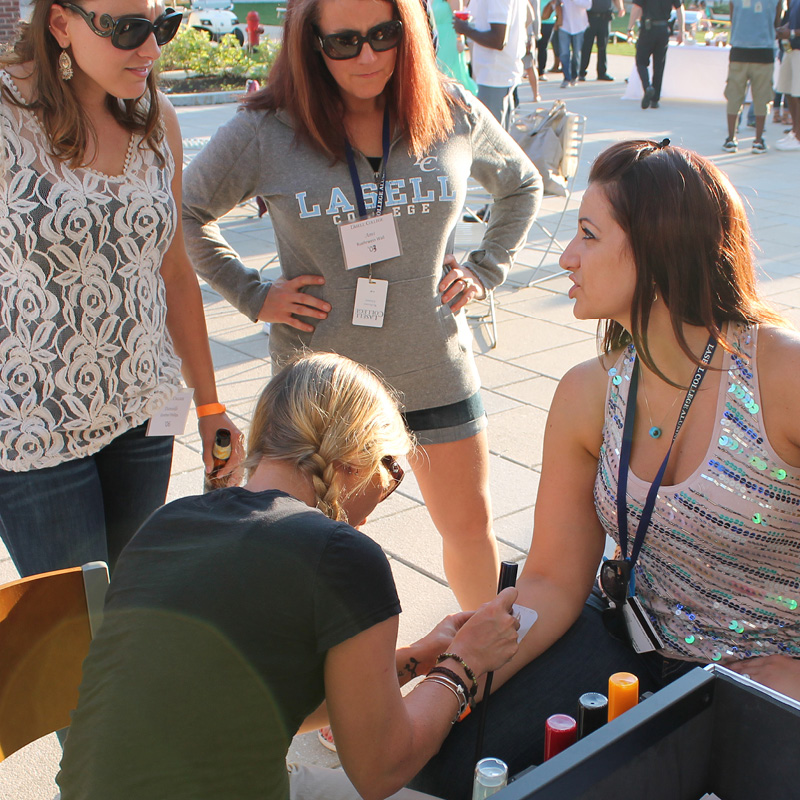 woman getting an airbrush tattoo