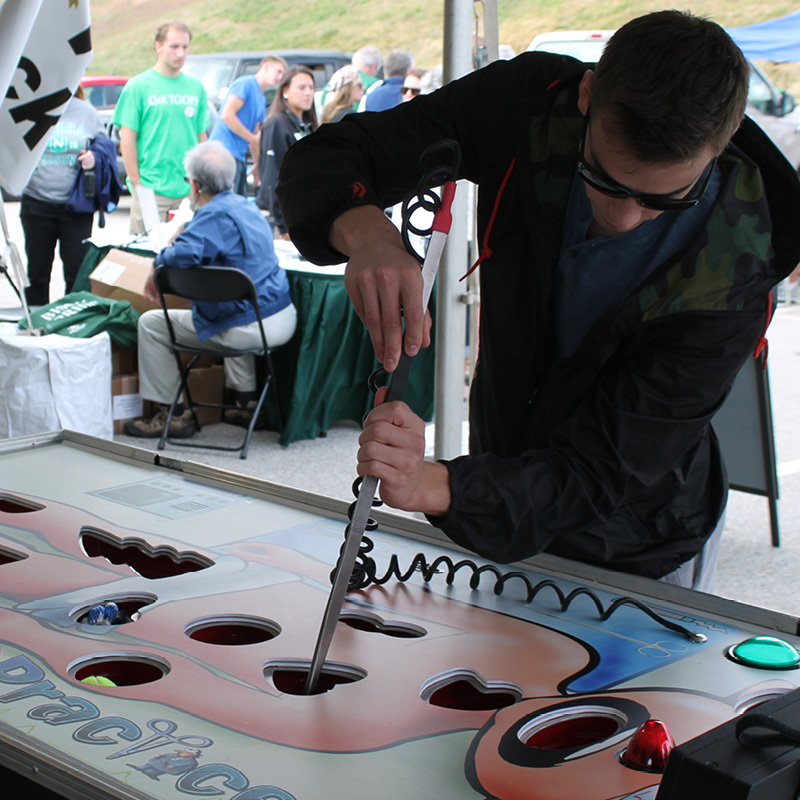 man playing giant malpractice game